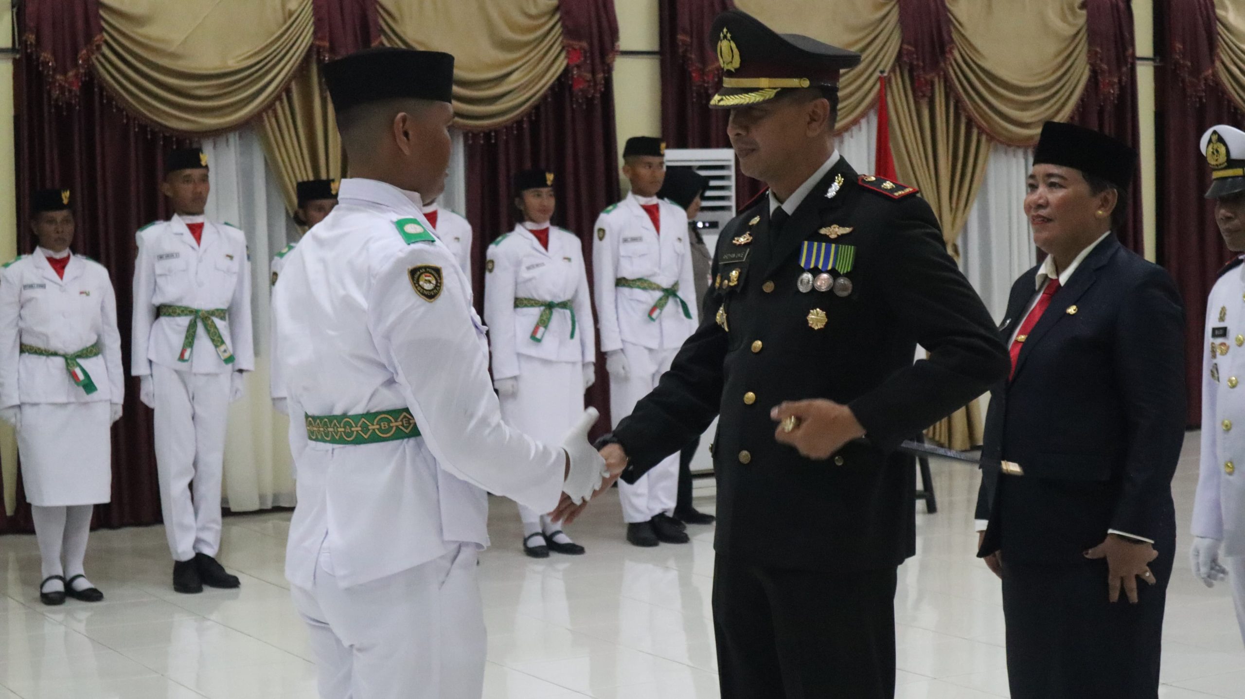 Kapolres Yapen Kompol Ardyan Hadiri Pengukuhan Pasukan Pengibar Bendera Pusaka Paskibraka Kab. Kep. Yapen Tahun 2024