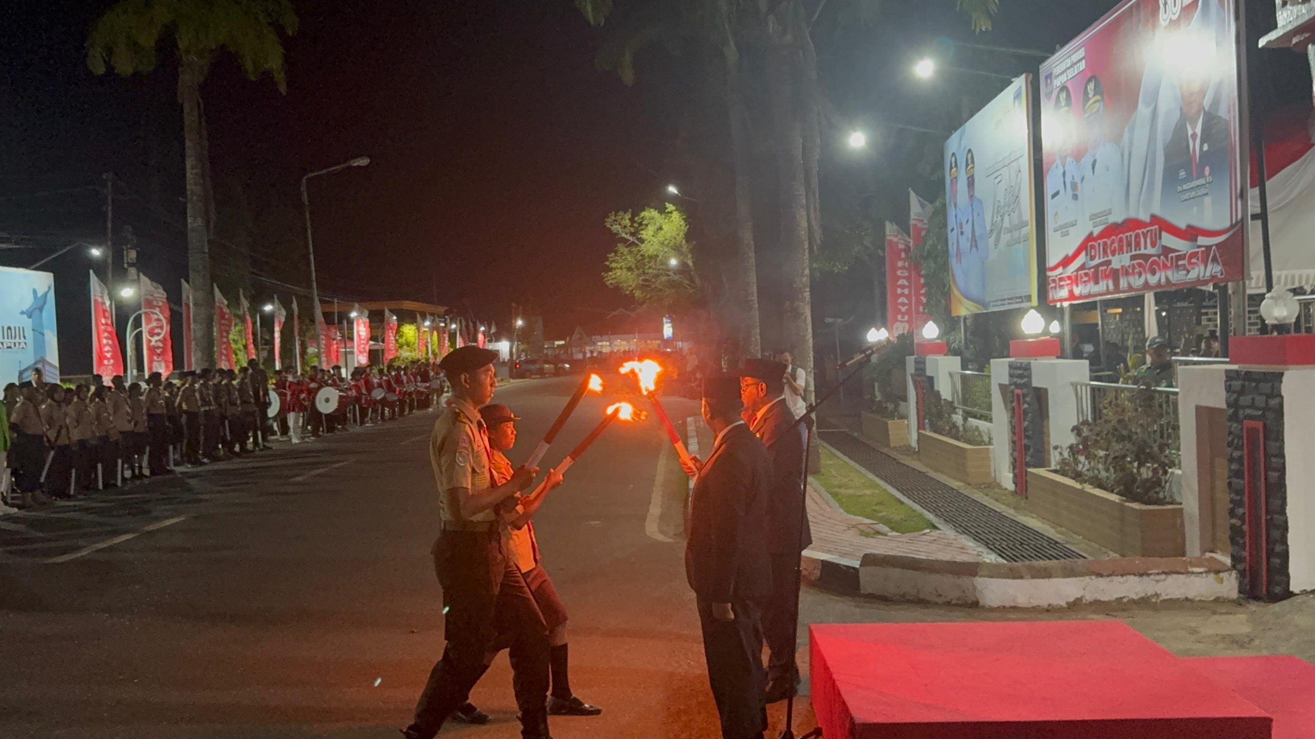Polres Merauke Ikuti Upacara Penetapan Waktu dan Pawai Obor di Gedung Negara Merauke